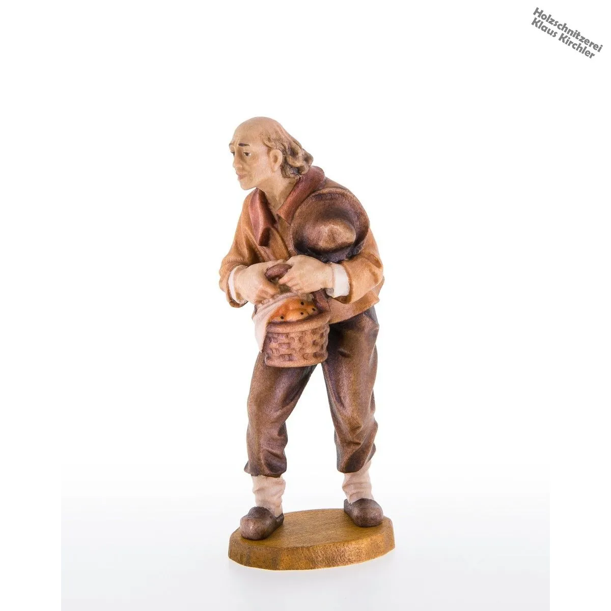 Hirt mit Hut und Obstkorb