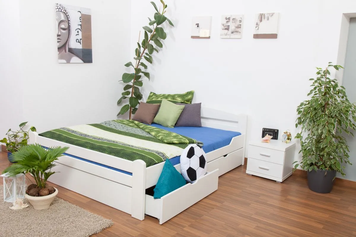 Doppelbett / Stauraumbett "Easy Premium Line" K4 inkl. 2 Schubladen und 1 Abdeckblende, 180 x 200 cm Buche Vollholz massiv weiß lackiert
