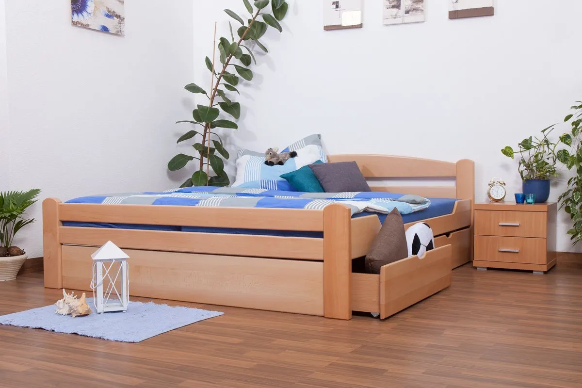 Doppelbett / Stauraumbett "Easy Premium Line" K4 inkl. 2 Schubladen und 1 Abdeckblende, 180 x 200 cm Buche Vollholz massiv Natur