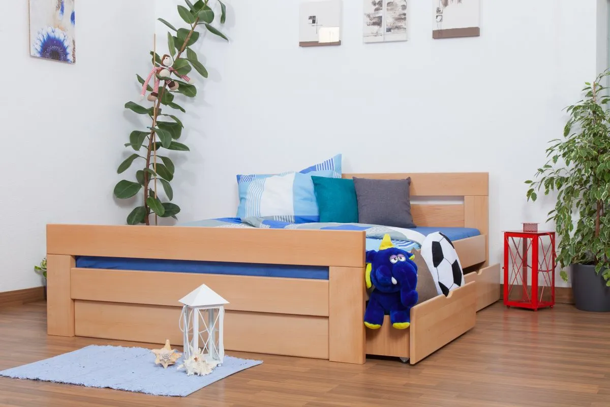 Doppelbett / Stauraumbett "Easy Premium Line" K6 inkl. 2 Schubladen und 1 Abdeckblende 160 x 200 cm Buche Vollholz massiv Natur