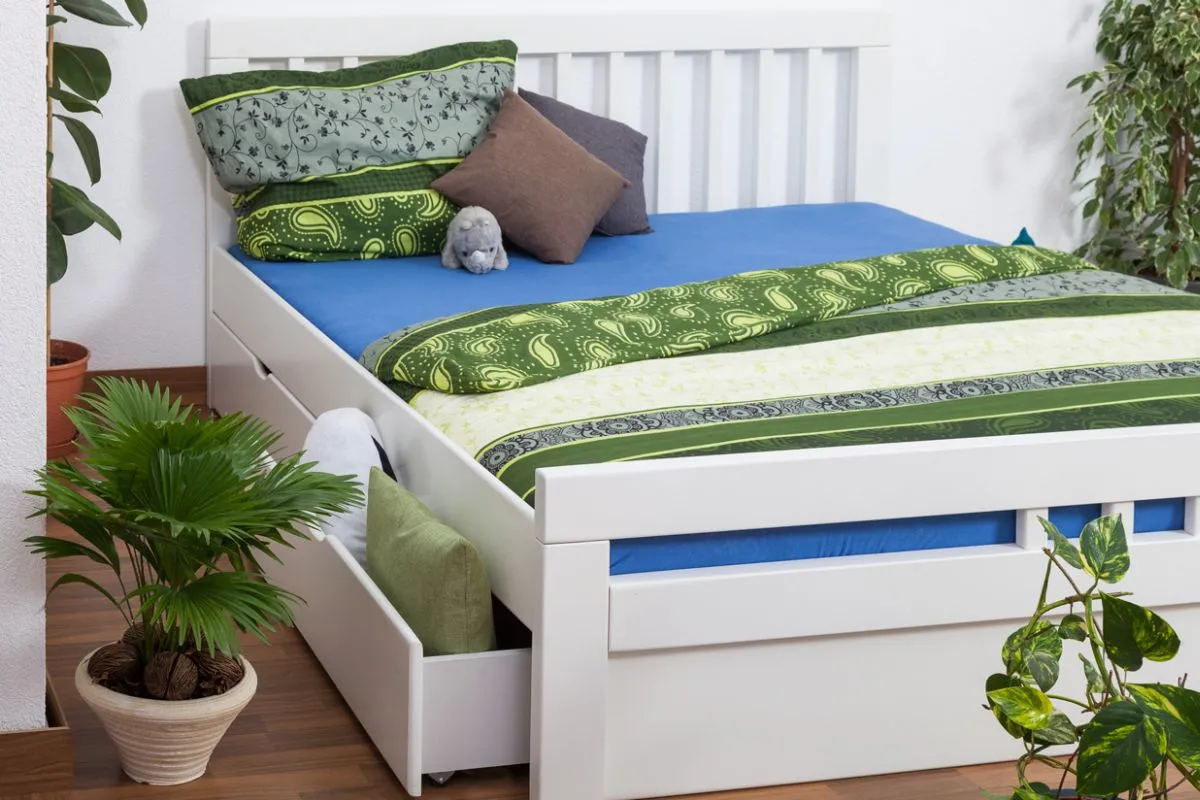 Doppelbett / Stauraumbett "Easy Premium Line" K8 inkl. 4 Schubladen und 2 Abdeckblenden, 180 x 200 cm Buche Vollholz massiv weiß lackiert